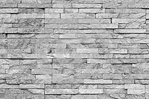 White natural facade stone decoration quartzite background texture. modern granite stone wall