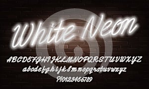 White Neon script alphabet font. Neon color lowercase and uppercase bright letters and numbers. photo