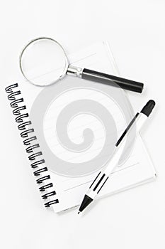 White notebook isolated with pen