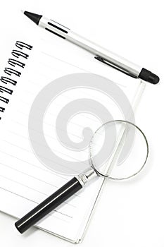 White notebook isolated with pen