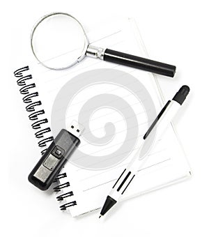 White notebook isolated with pen photo