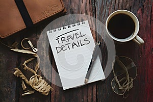 White notepad with pen, essential for jotting down travel details photo