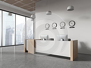 White office hall interior with reception and clocks