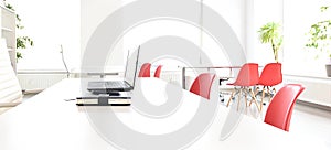 white office with red chairs