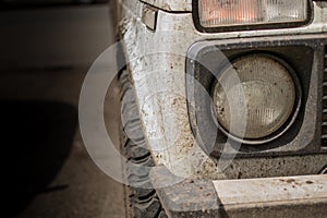 White Offroad Vehicle Covered in Mud