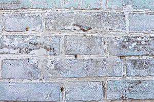 White old brick wall with peeling paint background, texture, place for text