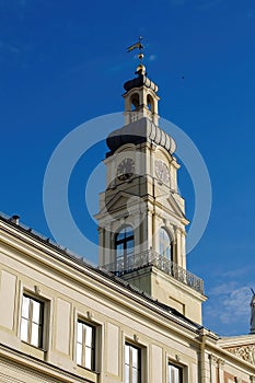 White old clock tower in the Gothic style, Riga. photo