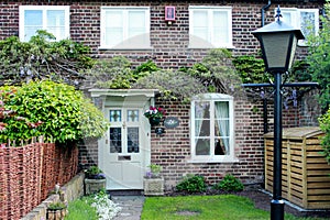 White Old Door and Window on a brick wall