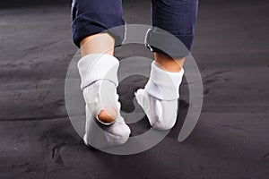 White old sock damage and hole