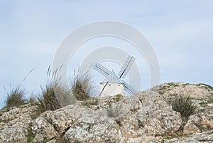 White old windmill on the hill near Consuegra photo