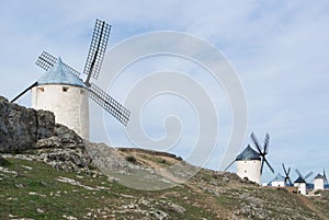 White old windmills on the hill near Consuegra