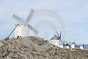 White old windmills on the hill near Consuegra photo