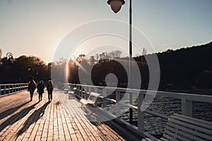 White Old wood bridge pier against beautiful sunset sky natural background, backdrop wallpaper multipurpose sea scene