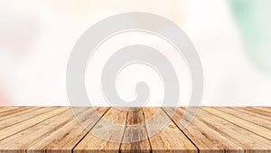 White old wood floor with blurred brown sepia tone background. Wooden planks stage texture and blur flare sunlight