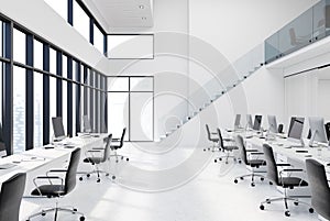 White open space office with stairs