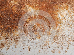 White and orange rusty background. Old rusty metal sheet. Brown grunge texture.