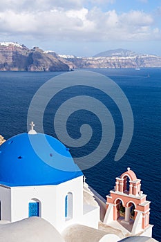 White orthodox church bell tower. Oia, Santorini Greece. Copyspace