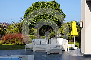 White outdoor furniture in the garden