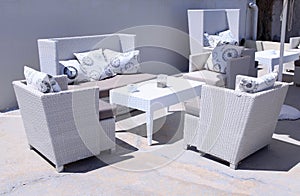 White outdoor furniture rattan armchairs