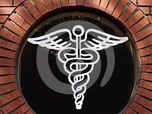 White outline medical symbol in round window