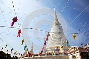 White Pagoda with lantern and ceremonial thread at Wat Prayurawongsawas Worawiharn