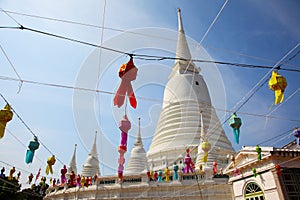 White Pagoda with lantern and ceremonial thread at Wat Prayurawongsawas Worawiharn