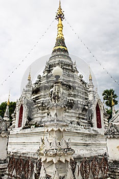 White pagoda in Thai temple in Pasang Lamphun