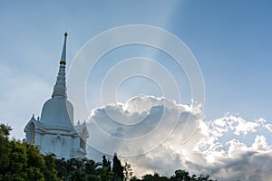 White pagoda which contain Buddha`s relics with beautiful blue s