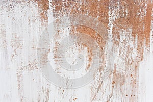 White paint abstract pattern on the surface of an old rusty metallic texture steel background rust brown