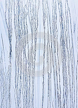 White paint layer on glass wall