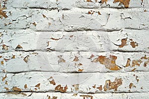 White painted cracked brick wall background