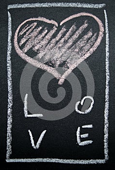 White painted heart on a black background