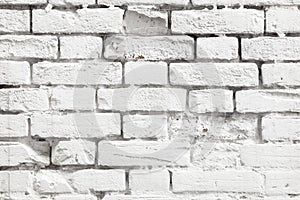 Niveous background of white painted old brick wall photo