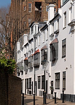 White painted residential building at Canning Place, Queen`s Gate, Kensington, London UK.