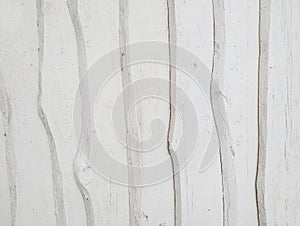 White painted wooden texture background. Rough uneven wooden vertical boards