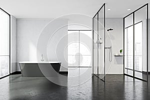 White panoramic bathroom space with walkways, black bathtub and glass shower cabin