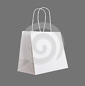 White paper bag, shopping parcel, packet with handles isolated