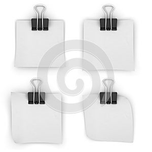 White paper binder clips on a white background.