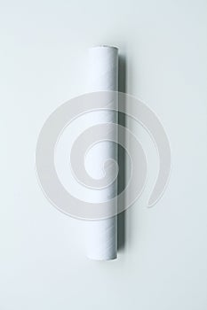 White paper, carboard tube in isolated white background