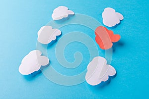 White paper clouds on blue background. Cloud computing concept