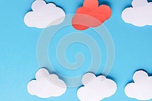 White paper clouds on blue background. Cloud computing concept. Copy space