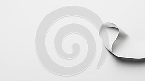 A white paper with a curved shape.