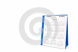 White paper desk spiral calendar on white background