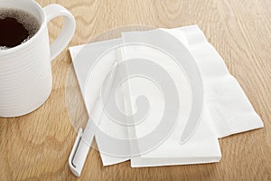 White Paper Dinner Napkin and Pen for Making Notes