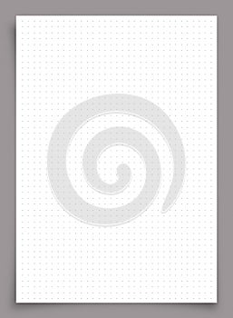White paper with dot pattern on gray background