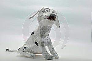 White paper mache dog