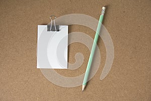 White paper message note with pencil