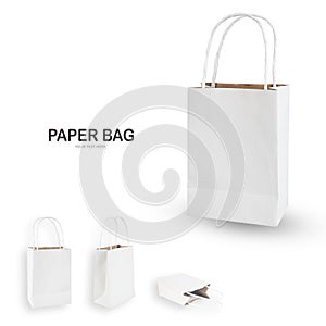 White paper shopping bag isolated on white .