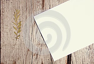 White paper on a wooden surface