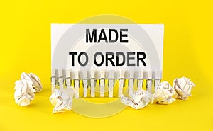 White paper on the yellow background with text MADE TO ORDER